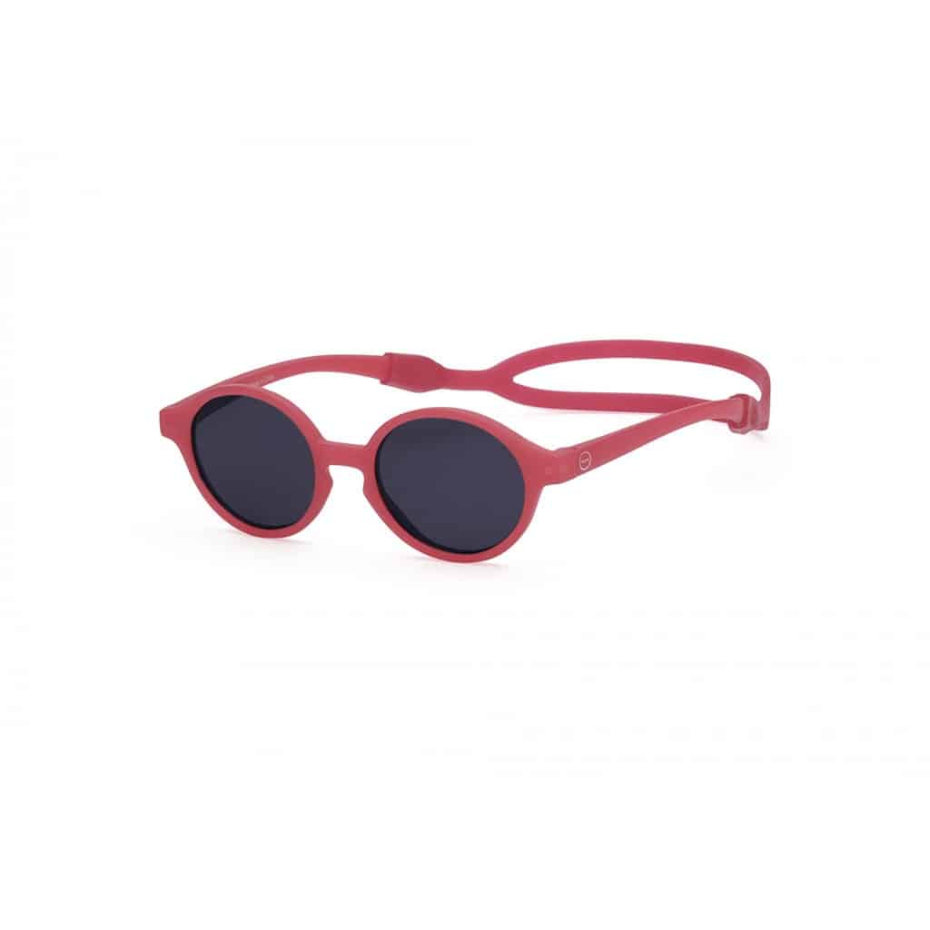 Lunettes de soleil kids couleur rouge pivoine de la marque izipizi