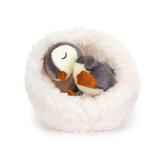 mini doudou pingouin dans son nid