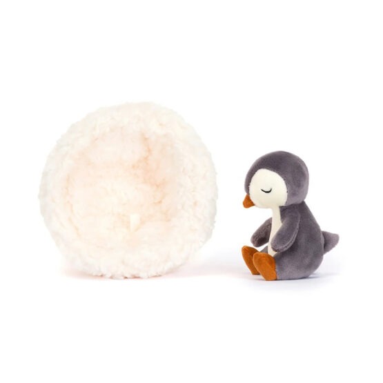 mini doudou pingouin et son nid de profil