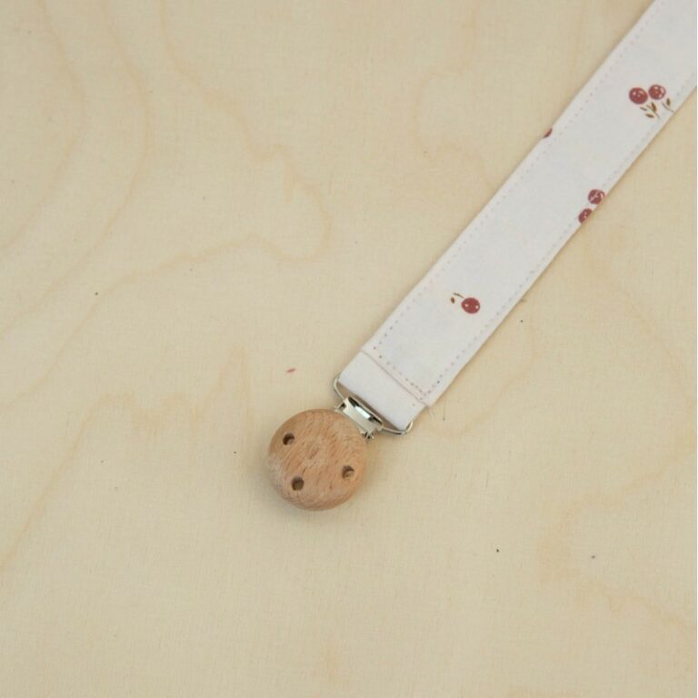 accroche tétine blossom dragée sur fond clair