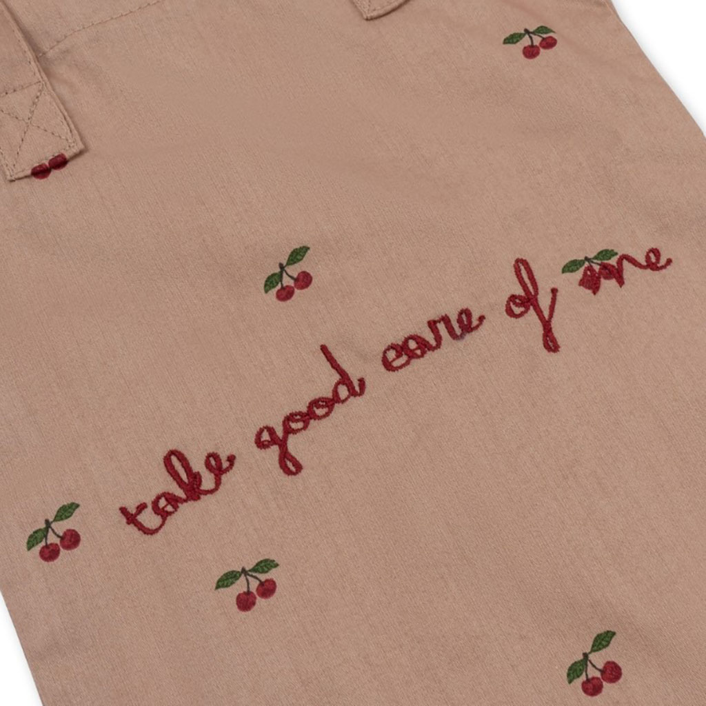 ensemble couche bavoir lange de la marque konges