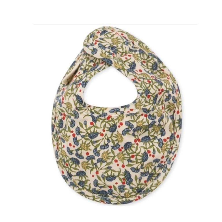 Ensemble couche, bavoir, lange pour poupées de la marque konges