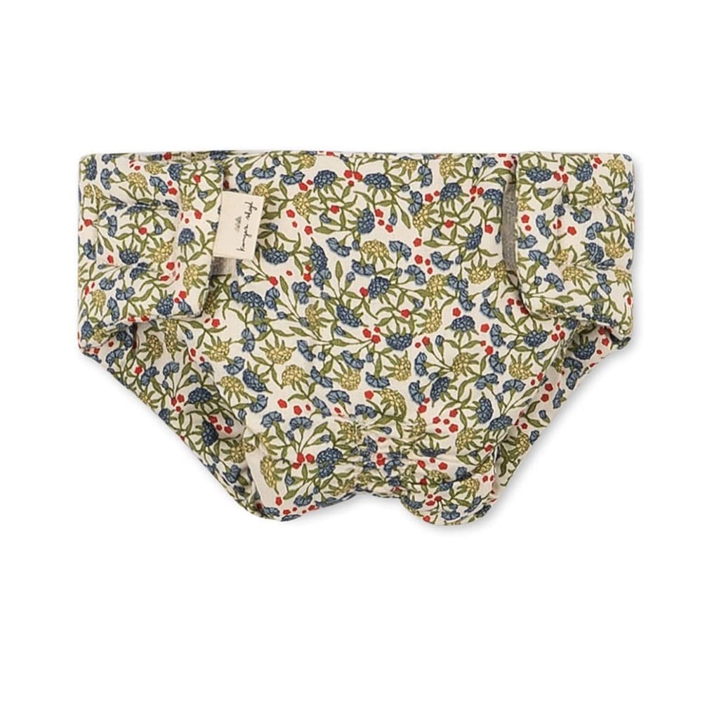 Ensemble couche, bavoir, lange pour poupées de la marque konges