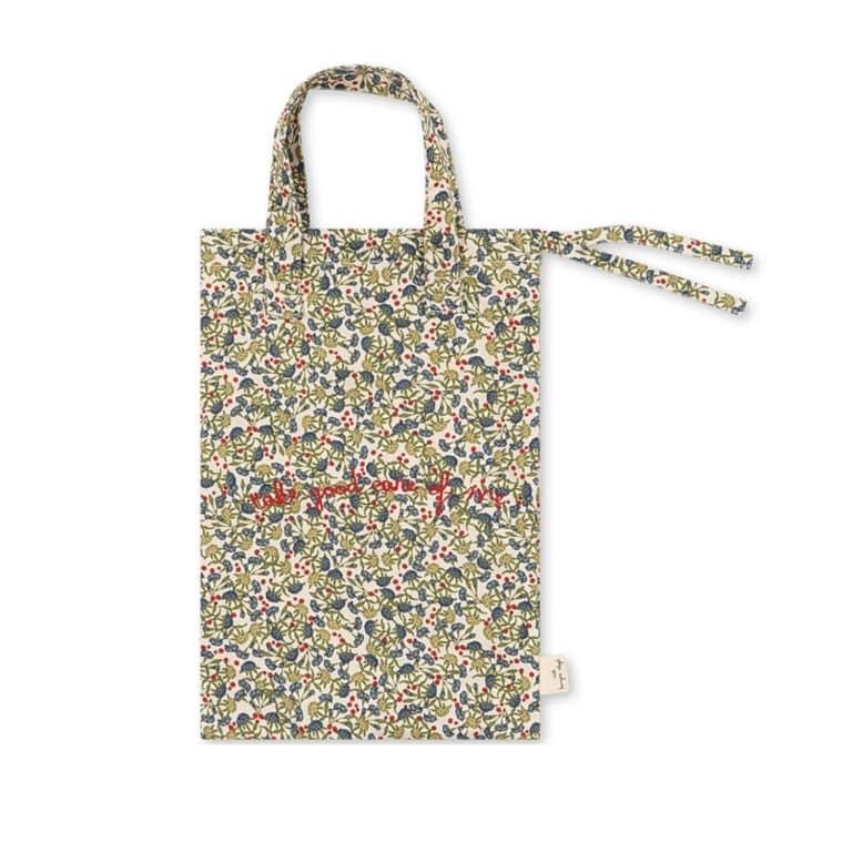 Ensemble couche, bavoir, lange pour poupées de la marque konges