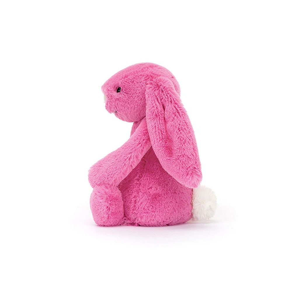 Doudou lapin de couleur rose fluo de la marque jellycat