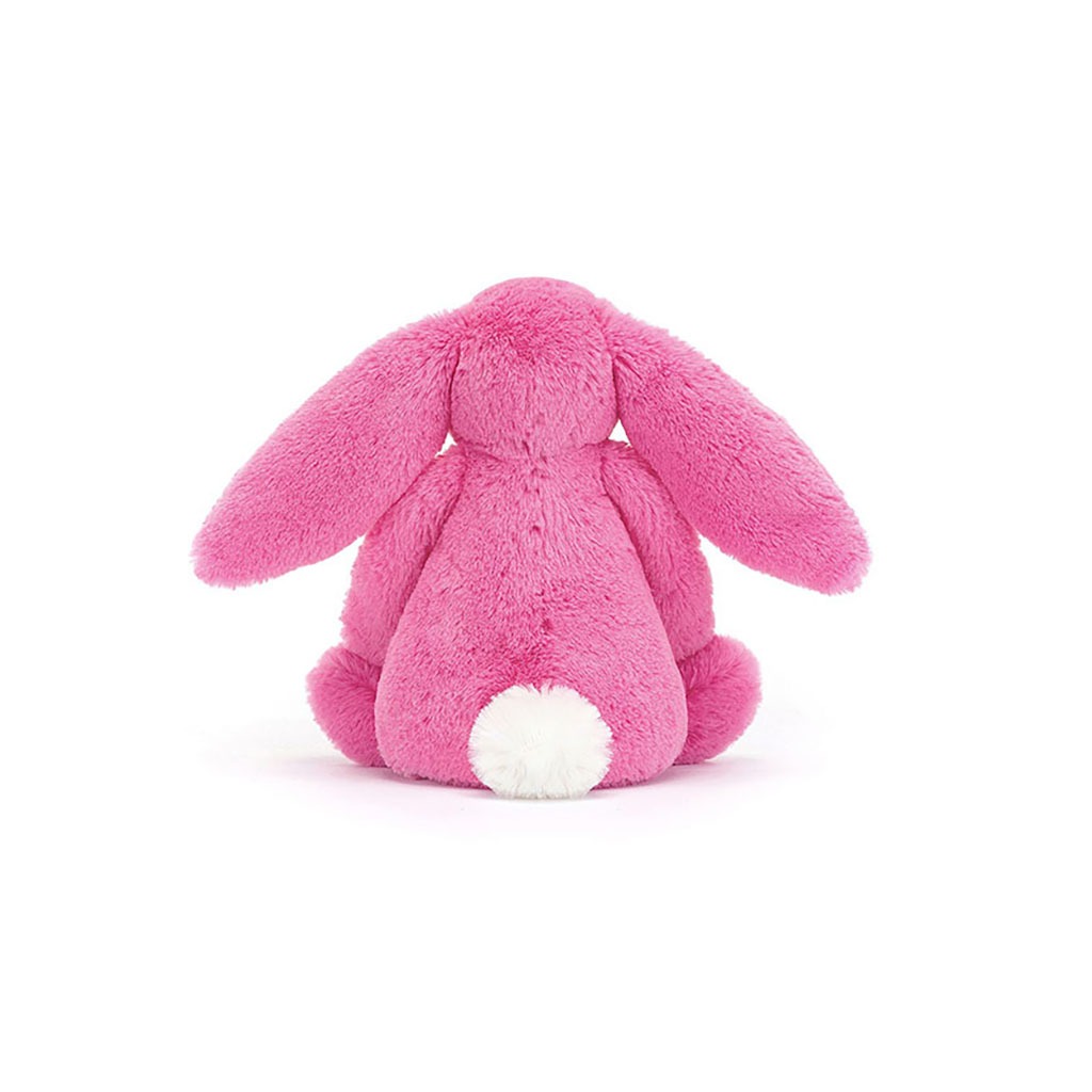 Doudou lapin de couleur rose fluo de la marque jellycat