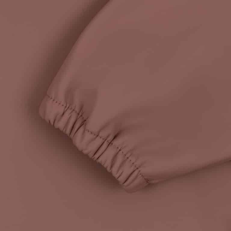 détail manche bavoir vieux rose konges