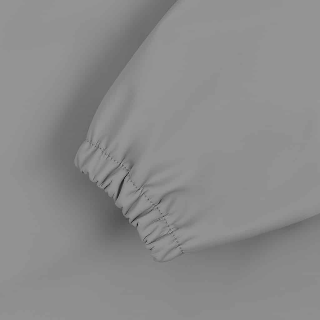 détail bavoir manche gris konges