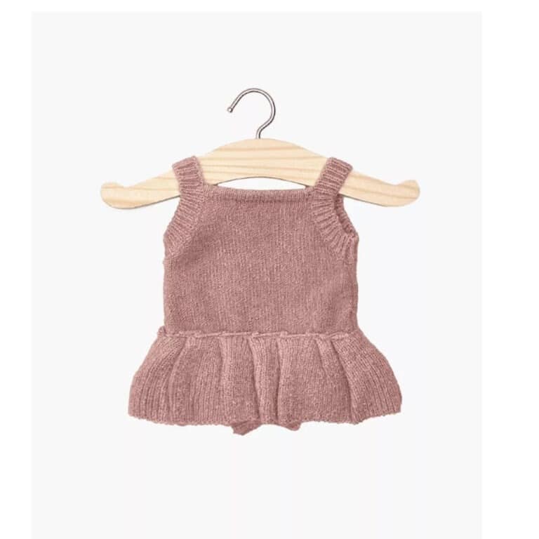 une barboteuse Orléane en tricot rose thé, vue de face sur fond blanc