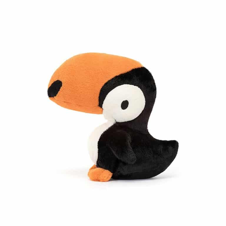 doudou toucan, vue de côté sur fond blanc