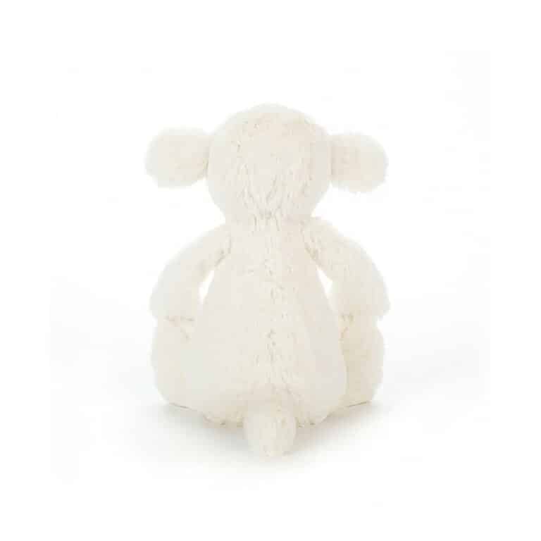 doudou petit mouton, vue de derrière sur fond blanc