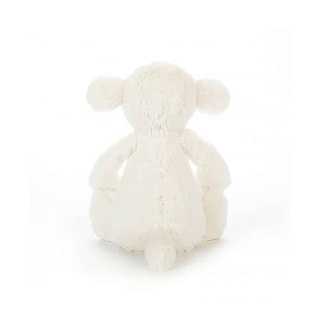 doudou petit mouton, vue de derrière sur fond blanc