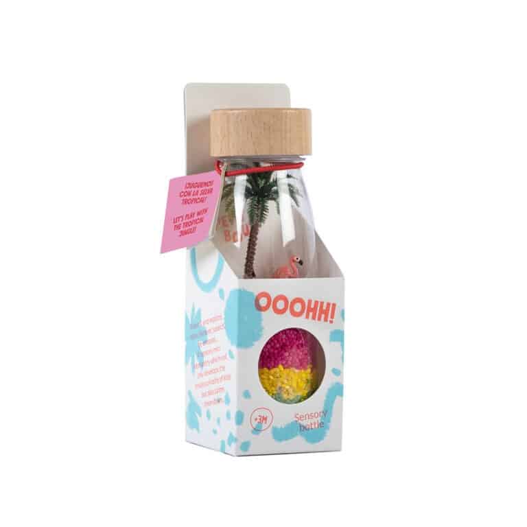 une bouteille sensorielle flamingo, vue de face dans son emballage sur fond blanc