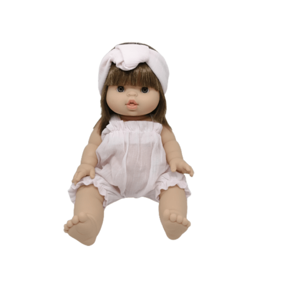 barboteuse rose et bandeau littlemarmaille porté par poupée sur fond blanc
