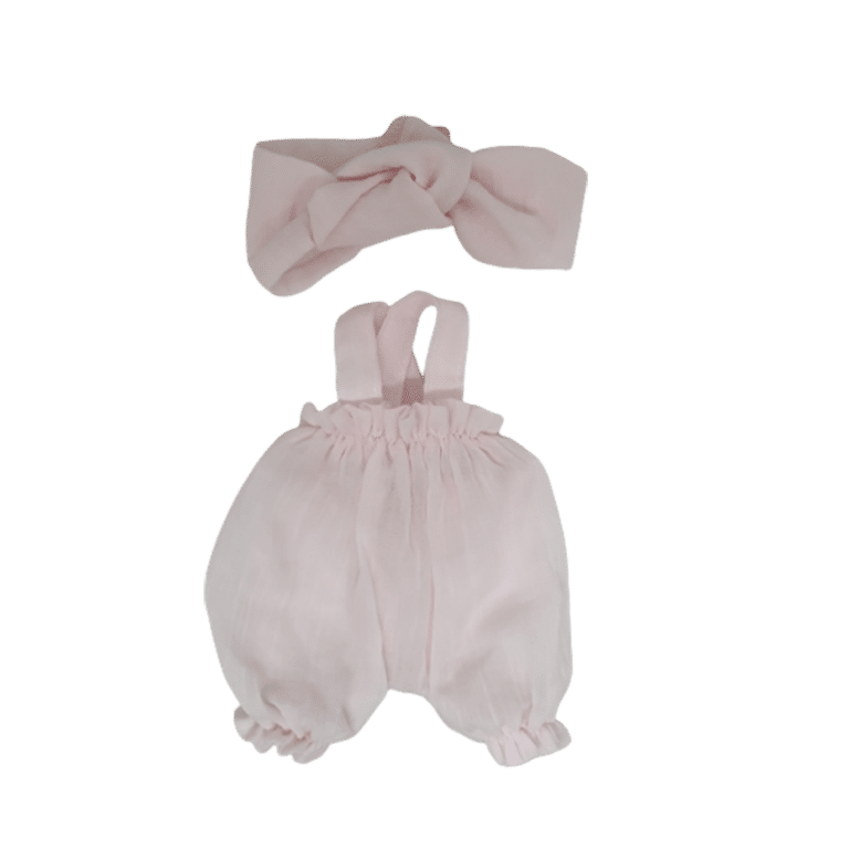 barboteuse rose et bandeau sur fond blanc
