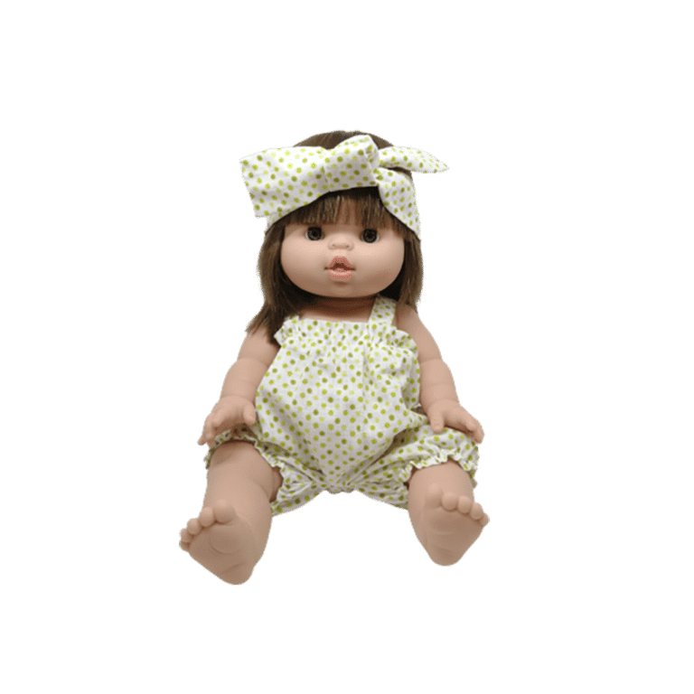barboteuse à pois verts et son bandeau porté par poupée sur fond blanc