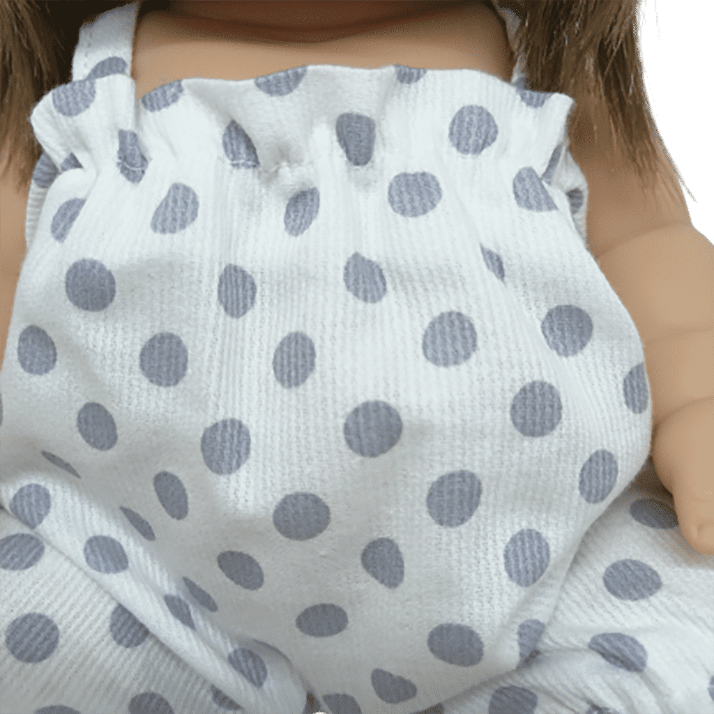 barboteuse blanche a pois gris détail tissu