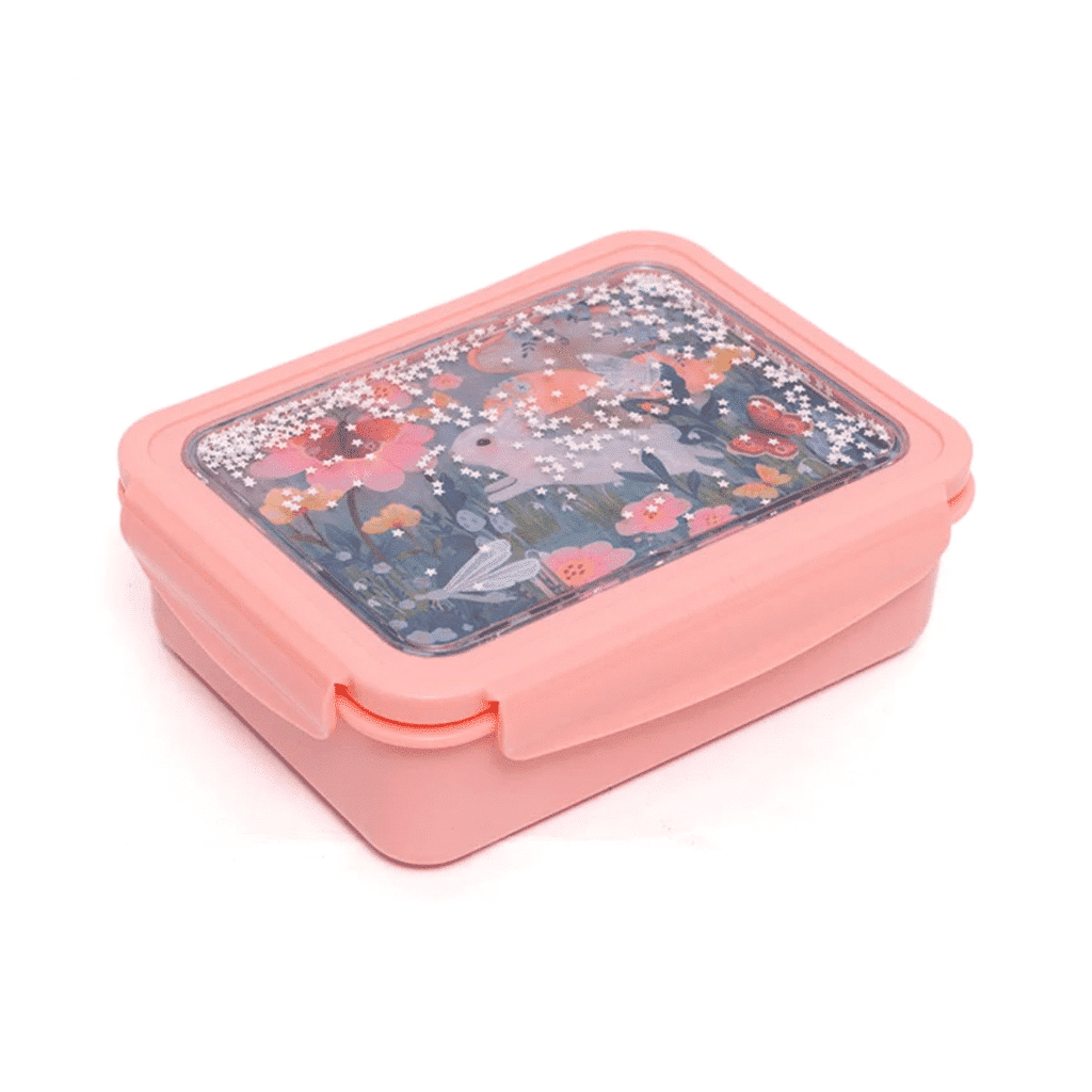 une boîte à repas lapin avec un couvercle à paillettes. Il y a trois compartiments amovibles. Vue de face sur fond blanc
