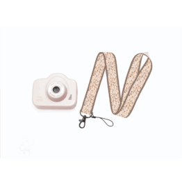 appareil photo rose poudré fond blanc