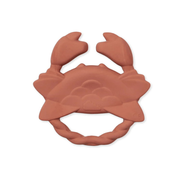 un anneau de dentition en forme de crabe camcam, vue de face sur fond blanc