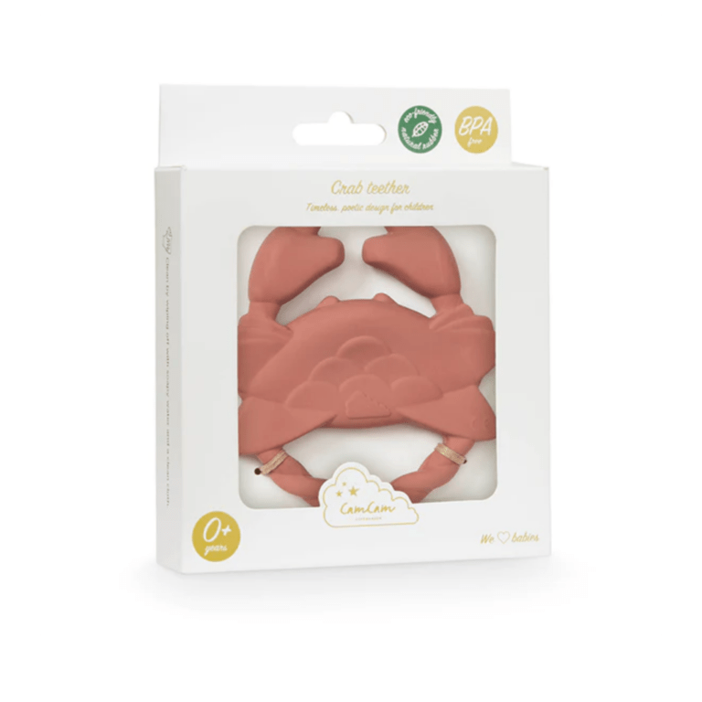 un anneau de dentition en forme de crabe camcam, vue de face dans son emballage sur fond blanc