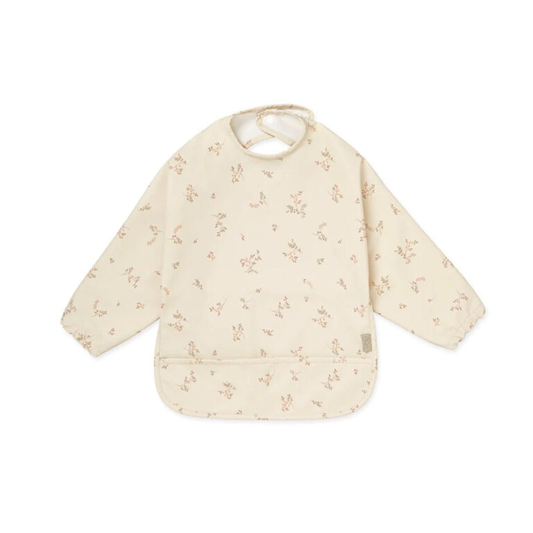 un bavoir plastifié fleurs, vue de face sur fond blanc