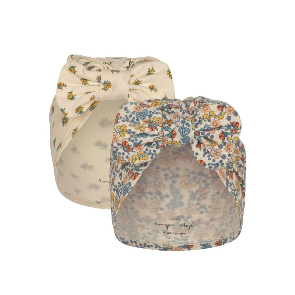 un lot de 2 turbans fleurs Konges Slojd, vue de face sur fond blanc