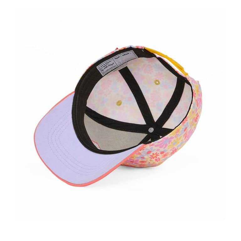 une casquette retro flowers Hello Hossy, vue de dessous sur fond blanc