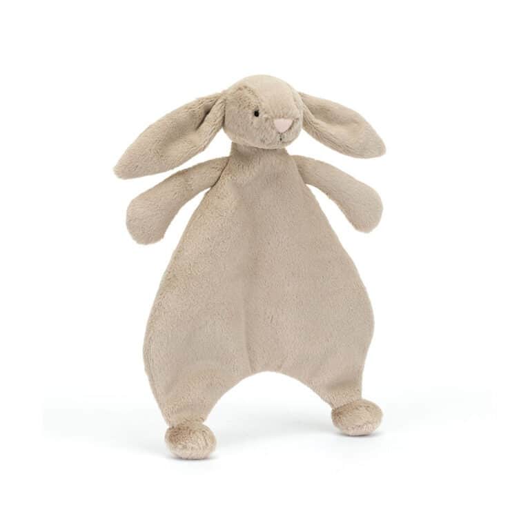 un doudou plat lapin beige Jellycat, vue de face sur fond blanc
