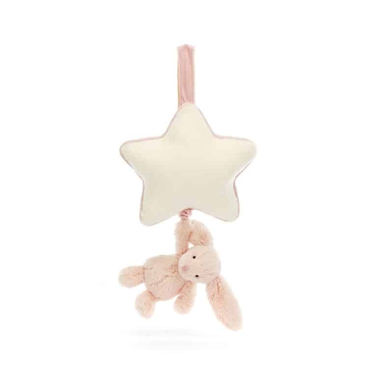 un doudou lapin rose musical Jellycat, vue de face sur fond blanc