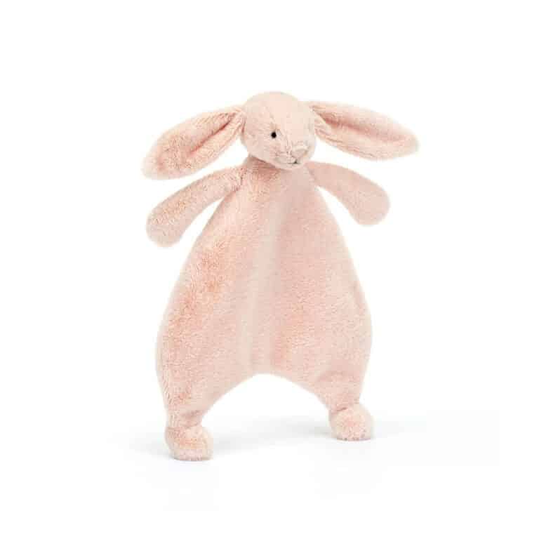 un doudou plat lapin rose Jellyact, vue de face sur fond blanc