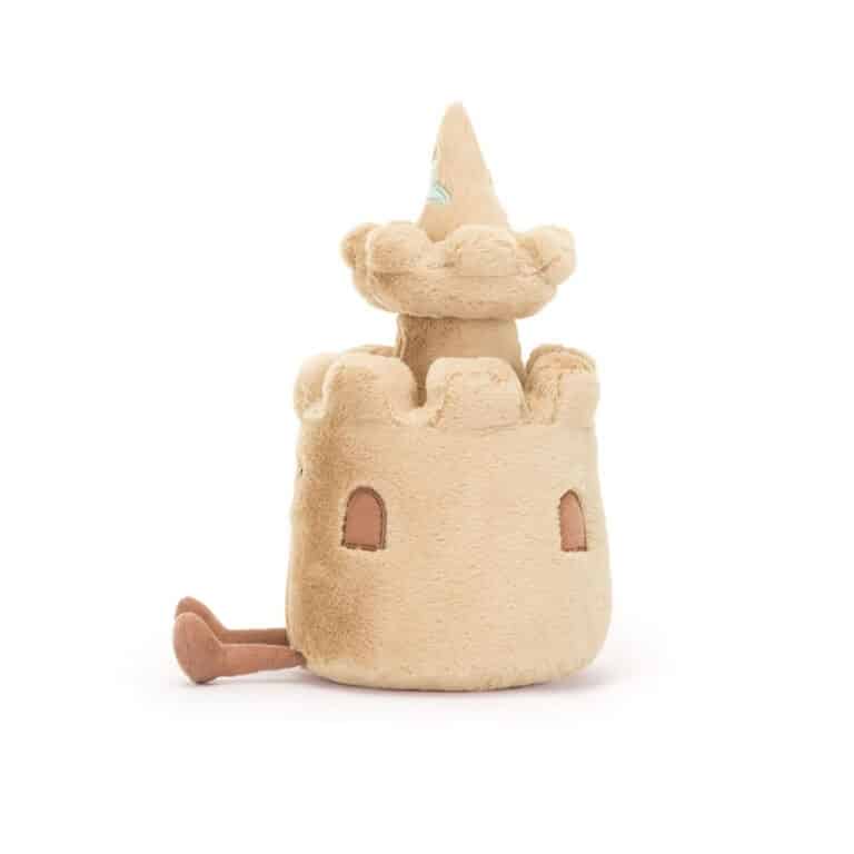 doudou amuseable château de sable jellycat vue de côté sur fond blanc