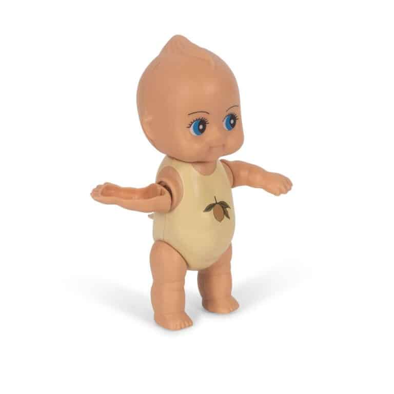 jouet de bain bébé nageur alfie konges slojd vue de côté sur fond blanc