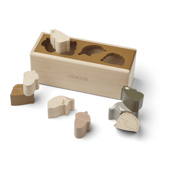 boîte a puzzle forêt caramel liewood sur fond blanc