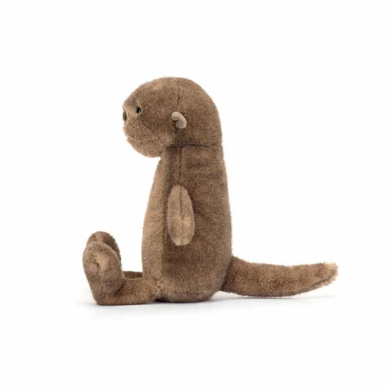 un doudou brooke la loutre Jellycat, vue de côté sur fond blanc