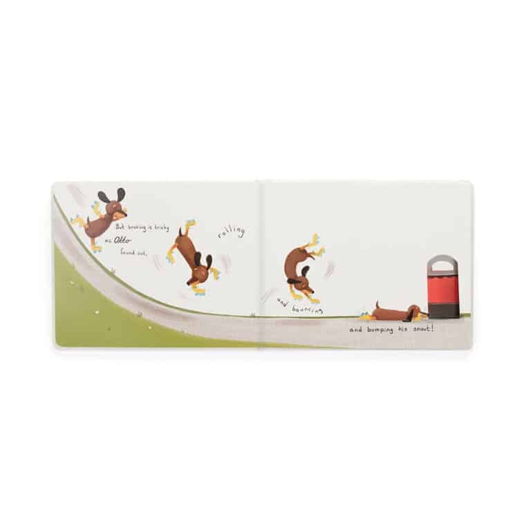 un livre Otto le chien saucisse Jellycat, vue de face sur fond blanc