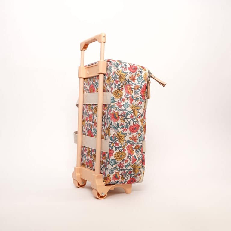 une valise cabine Louise Misha de chez Jojofactory, vue de côté sur fond blanc