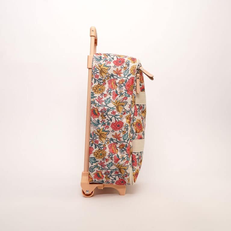 une valise cabine Louise Misha de chez Jojofactory, vue de côté sur fond blanc