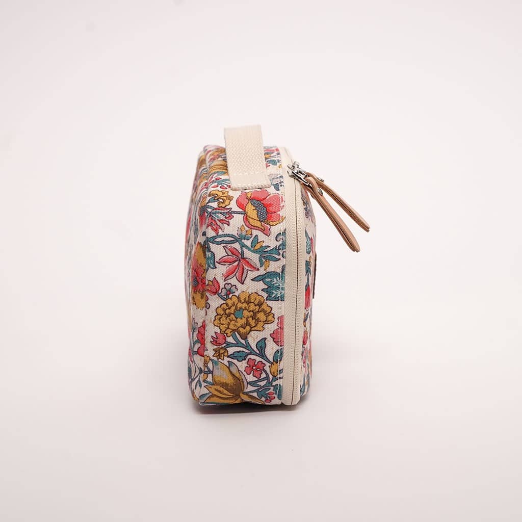 un sac isotherme Louise Misha de la marque Jojofactory, vue de côté sur fond blanc