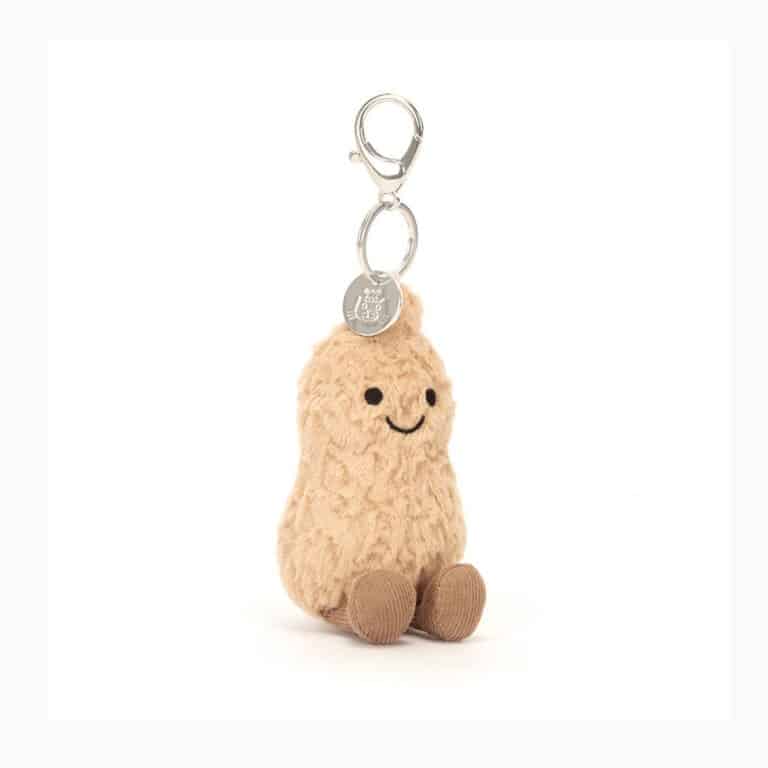 un porte-clé cacahuète Jellycat, vue de face sur fond blanc