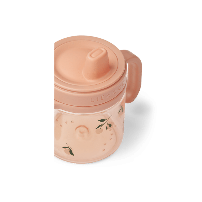 Tasse en tritan poignées et tétine motif pêches de la marque liewood