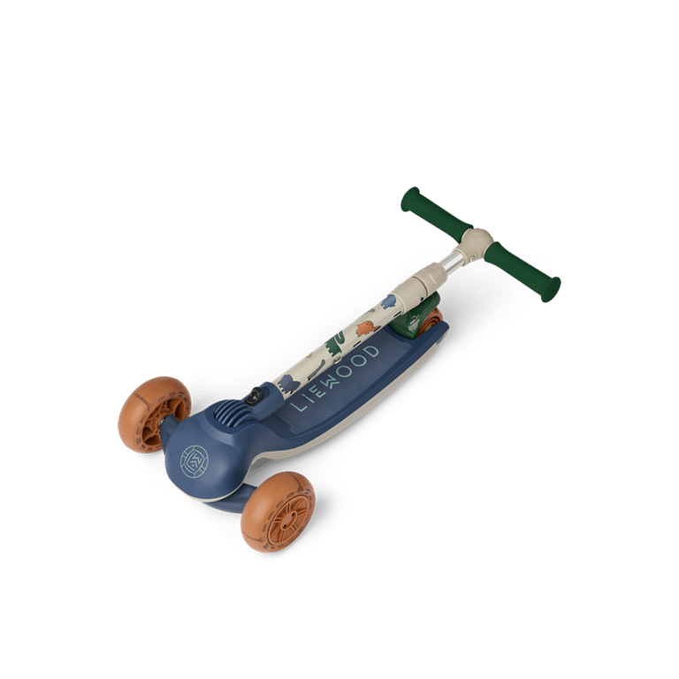 Trottinette trois roues motif dinosaures sur fond blanc | Magasin de jouets à Vannes