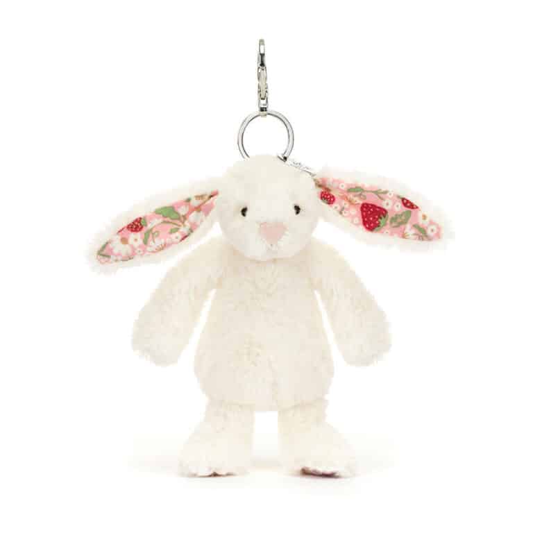 Porte-clé lapin crème aux oreilles petites fraises  –  Jellycat - Vu de face sur fond blanc