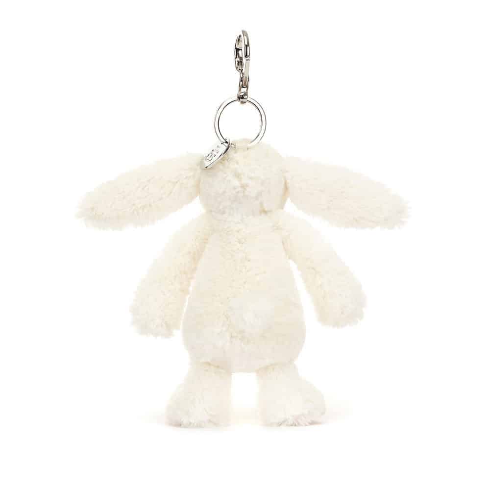 Porte-clé lapin crème aux oreilles petites fraises  –  Jellycat - Vu de dos sur fond blanc
