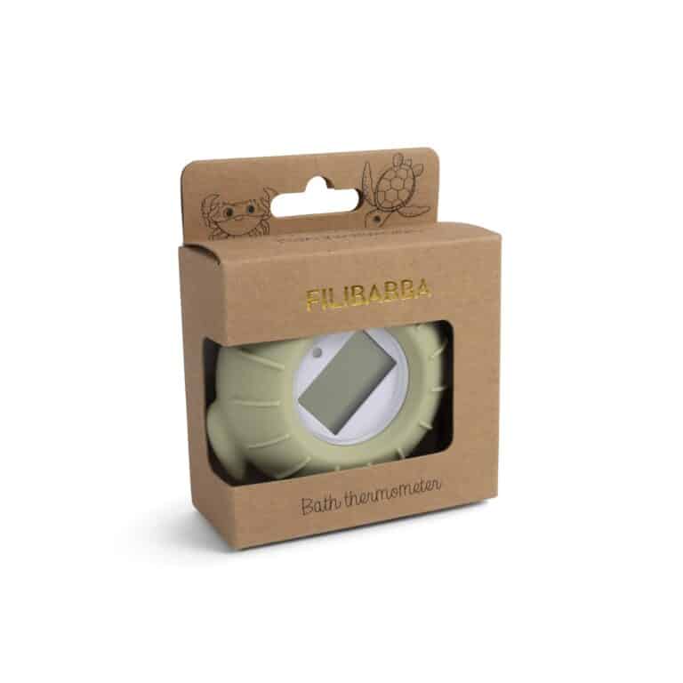 Thermomètre de bain en silicone - Tortue - Filibabba, vue de côté sur fond blanc dans sa boite