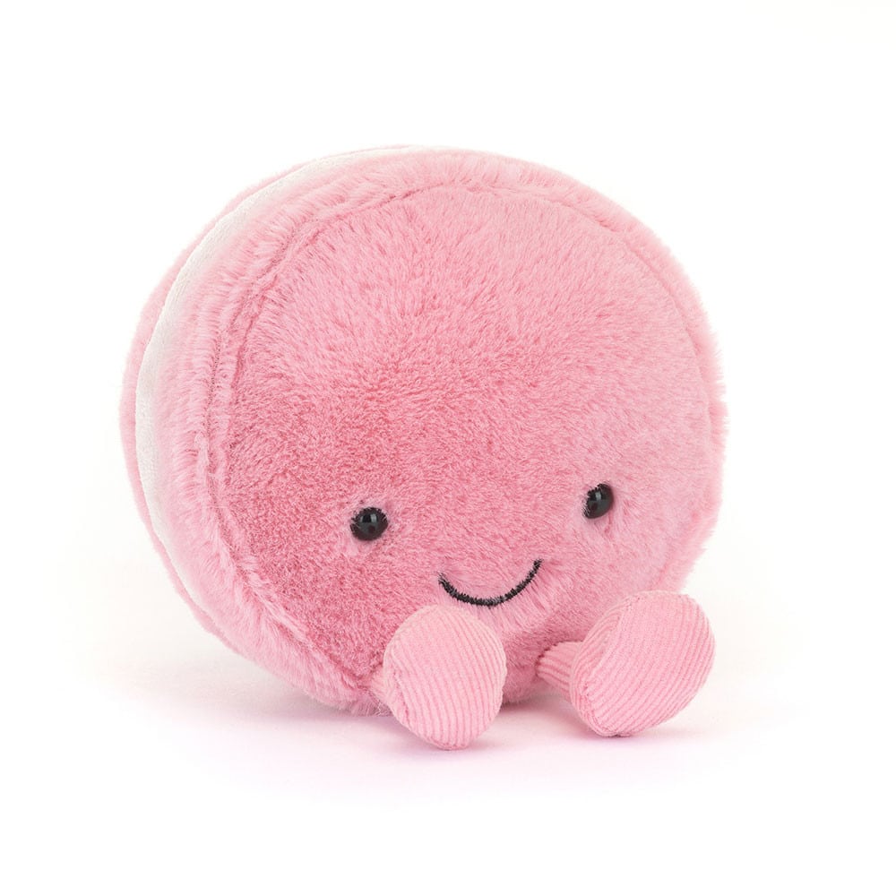Doudou macaron amuseables rose Mia - Jellycat, vue de biais sur fond blanc