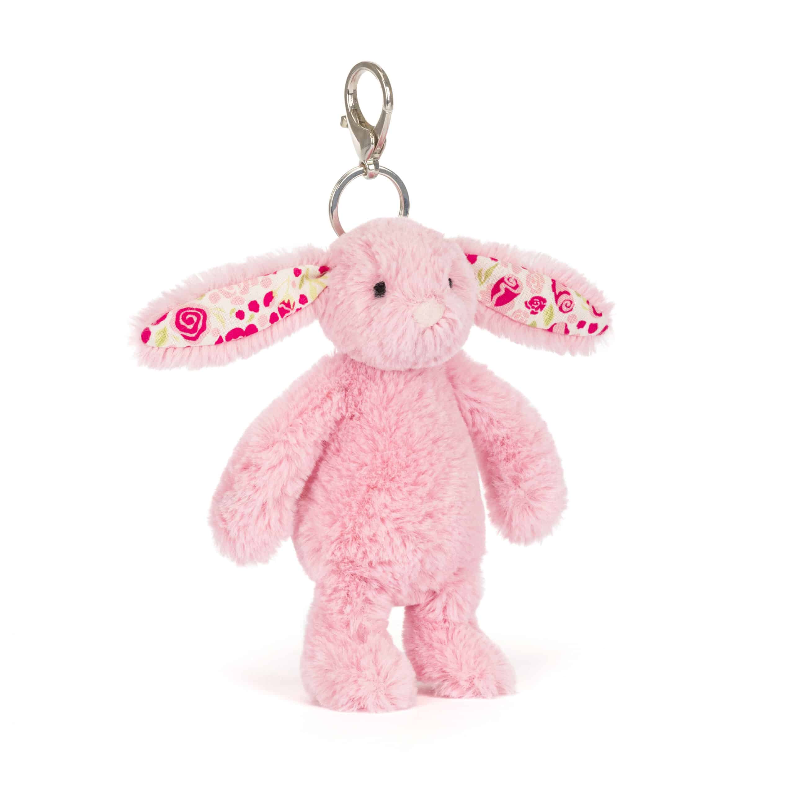 Blushkin Blossom bunny bag charm - Jellycat, vue de biais sur fond blanc