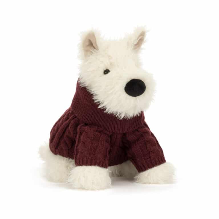 Munro Scottie Dog 'Winter Jumper' - Jellycat, vue de biais sur fond blanc